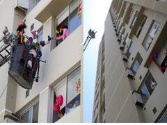 Watch: फायर ब्रिगेड की गाड़ी की सीढ़ियों पर चढ़े सेंटा, कोविड-19 से संक्रमित बच्चों को अस्पताल में बांटे गिफ्ट