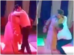 Watch: महिला को गोद में उठाना युवक को पड़ा भारी, वीडियो देखकर नहीं रुक पाएगी आपकी हंसी!