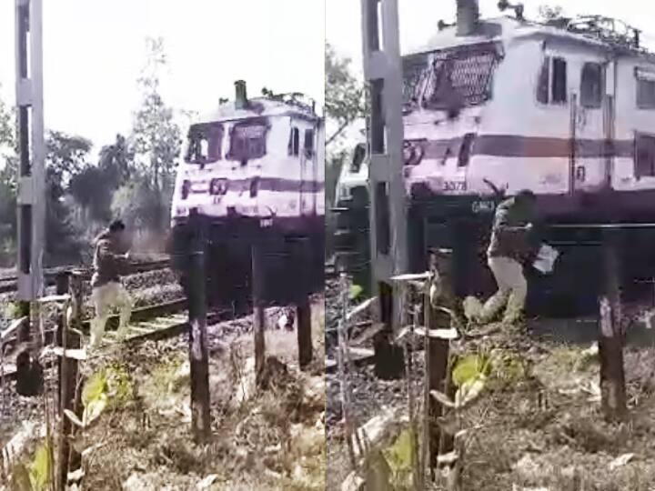 VIDEO: train driver saved life of private company employee on railway track dhanbad jharkhand ann VIDEO: झारखंड के धनबाद में ट्रेन की चपेट में आने वाला था शख्स, ड्राइवर ने यूं बचाई जान, वीडियो देखकर धड़क उठेगा दिल