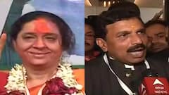 KMC Election Result 2021: সবুজ ঝড়ের মধ্যেও অপরাজিত BJP-র মীনাদেবী পুরোহিত, কংগ্রেসের সন্তোষ পাঠক | Bangla News