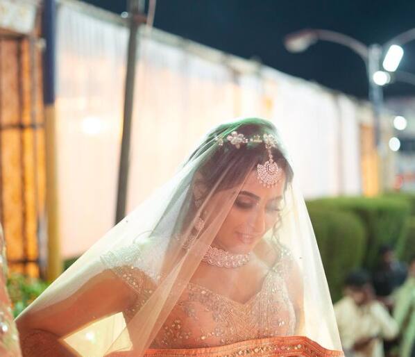 The actress opted for a veil that completed her sangeet look.