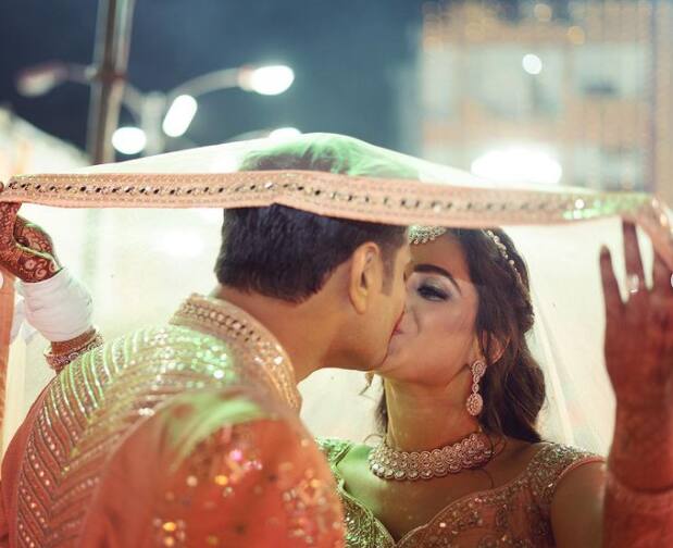 In one of the picture the actress can be seen locking lips with her husband as she gears up for her performance on stage.