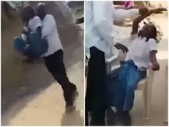 Corona Vaccine लेने से डर रहा था शख्स, गोद में उठाकर लाने पर जोर-जोर से लगा चिल्लाने, देखें Video