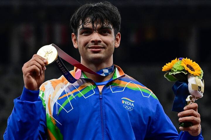 Gold medallist India's Neeraj Chopra celebrates on the podium during the victory ceremony for the men's javelin throw event during the Tokyo 2020 Olympic Games at the Olympic Stadium in Tokyo on August 7, 2021. (Image: AFP)
