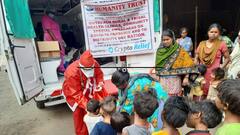 Kolkata: বড়দিনে করোনা সচেতনতায় ছোটদের জন্য মাস্ক, স্যানিটাইজার বিতরণ ডাক্তার 'সান্তা'র
