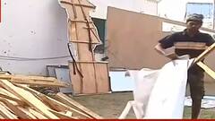 TMC: দলনেত্রীর বার্তার পরই শুরু তৃণমূলের পতাকা-হোর্ডিং খোলার কাজ। Bangla News