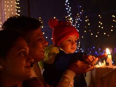 IN PICS | People Attend Midnight Mass, Celebrate Christmas Amid Omicron Scare