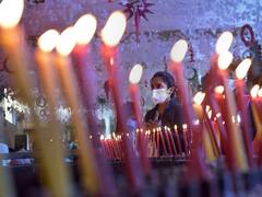 IN PICS | People Attend Midnight Mass, Celebrate Christmas Amid Omicron Scare