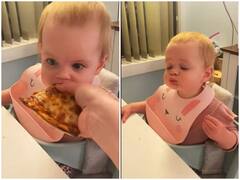 Watch: सोशल मीडिया पर वायरल हुआ पहली बार पिज्जा खाती बच्ची का रिएक्शन, वीडियो ने जीता दिल