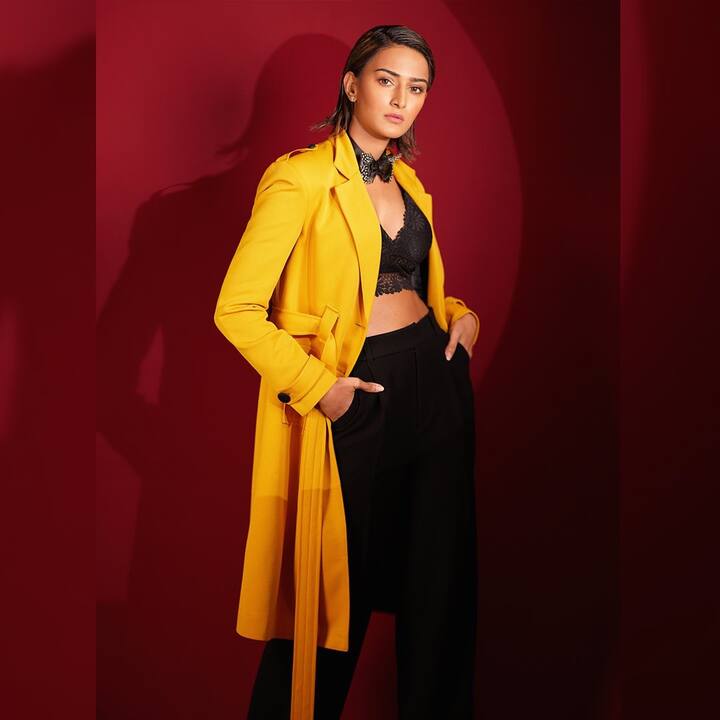 Popular Television actress Erica Fernandes is raising the style quotient with her recent look. The actress can be seen donning a formal look in the pictures shared by her on social media. (Image courtesy - @iam_ejf/Instagram)