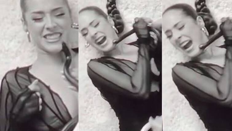 viral video Shocking Snake bites singer on her face during shoot Viral Video: গানের শ্যুটের মাঝে গায়িকাকে সাপের ছোবল, শিউরে ওঠা ভিডিও ভাইরাল