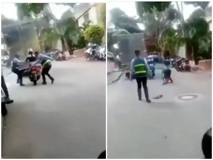 Video : ਸਕੂਟੀ ਚਲਾ ਰਹੀ ਲੜਕੀ ਨੂੰ ਰੇੋਕਣ ਦੀ ਕੋਸ਼ਿਸ਼ 'ਚ ਡਿੱਗਿਆ ਪੁਲਿਸ ਮੁਲਾਜ਼ਮ, ਵੀਡੀਓ ਵਾਇਰਲ