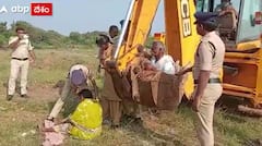 మల్టీపర్పస్ ఫెసిలిటీ సెంటర్ నిర్మాణ పనులను అడ్డుకుంటూ జేసీబీ తొట్టెలో ఆందోళన