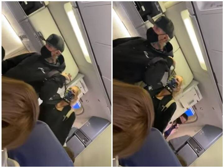Person who was treated like an animal with a partner in the flight arrived with a strap around his neck Watch: फ्लाइट में पार्टनर के साथ किया जानवरों जैसा व्यवहार, गले में पट्टा बांधकर पहुंचा शख्स