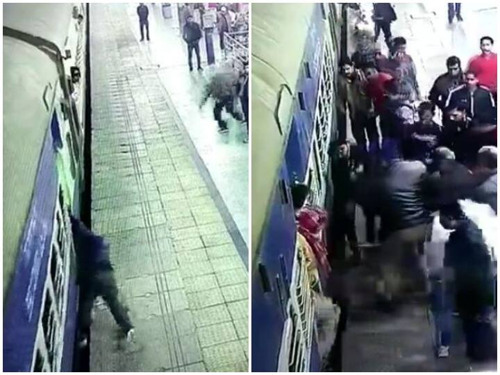 passenger trapped between moving train and Platform at Kanpur railway station in Uttar Pradesh RPF jawan saved him Watch: चलती ट्रेन और प्लेटफॉर्म के बीच फंसा एक यात्री, RPF जवान की समझदारी से बची जान