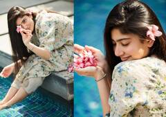 Sai Pallavi Photos: बालों में फूल लगाए स्विमिंग पूल के किनारे एक्ट्रेस साई पल्लवी ने दिखाई अपनी अदाएं