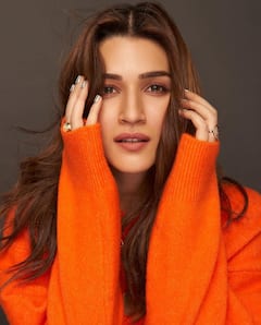 PICS | Kriti Sanon Shines Bright In Orange Sweater