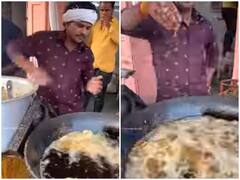 Watch: नंगे हाथ से पकौड़ी छानता दिखा शख्स, वायरल हुआ जयपुर का हीटप्रूफ पकौड़ी वाला