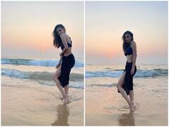 Mouni Roy Photos: समंदर किनारे ब्लैक ड्रेस में इठलाती-बलखाती नजर आईं मौनी रॉय, देखिए तस्वीरें