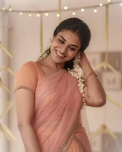 Indhuja pics: பட்டுப்புடவையில் பச்சை கிளியாக ‘மேயாத மான்’ நடிகை...!