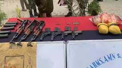 J&K | BSF finds Sack bag with weapons with something written in URDU on it