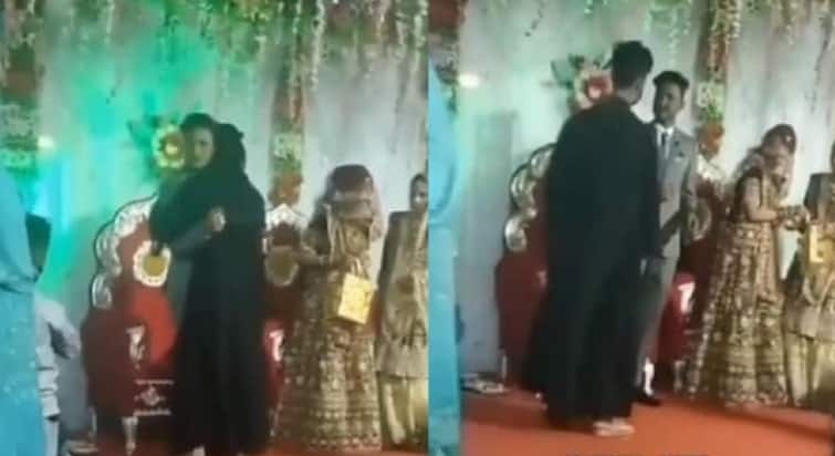 prank with groom by friend in wedding, video getting viral, groom friend came in burka and hug him so many time Watch : निकाह पर दूल्हे को बार-बार गले लगाकर बधाई दे रही थीं 'मोहतरमा', बुर्का हटाने पर खुला असली राज
