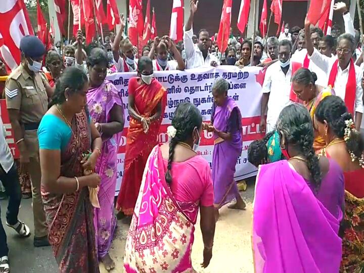 Mayiladuthurai: Women protest by pouring ration rice on the road ரேஷன் அரிசியை ரோட்டில் கொட்டி ஒப்பாரி வைத்து பெண்கள் ஆர்ப்பட்டம்