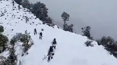 Indian Army personnel stand strong amid heavy snowfall in JK's Udhampur