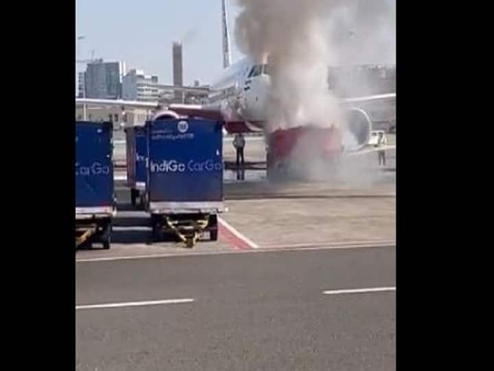 Pushback tow tug catches fire at Mumbai airport, 85 passengers was onboard Mumbai Airport पर टला बड़ा हादसा, फ्लाइट को पुशबैक देने वाले वाहन में लगी आग पर समय रहते हुआ कंट्रोल