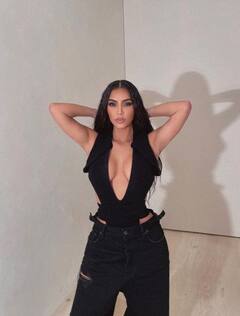 Kim Kardashian Poses In Risqué Black Plunging Top In NEW PICS, Days After Her Bahamas Trip With Beau Pete Davidson