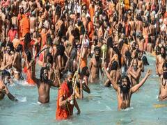 Magh Mela 2022 :कोरोना संकट के बीच आज से शुरु हुआ माघ मेला, लाखों लोग लगा रहे 'आस्था' की डुबकी, सुपर स्प्रेडर बन सकता है मेला