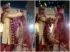 Watch: जयमाला के दौरान स्टेज पर दूल्हे को बचाकर दुल्हन ने जीता सबका दिल, वीडियो हुआ वायरल