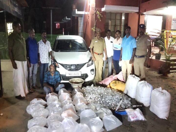Seizure of 1,000 liters of liquor smuggled in a luxury car from Karaikal காரைக்காலில் இருந்து காரில் கடத்தி வரப்பட்ட 1,000 லிட்டர் சாராயம் பறிமுதல்