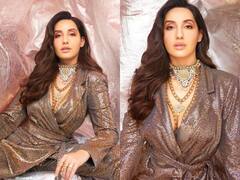 Nora Fatehi Photos: गले में महारानी हार, चम-चम करता पैंट सूट पहन 'रानी' बनीं नोरा फतेही, देखें ग्लैमर क्वीन का Killer लुक