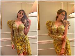 Nikki Tamboli Photos: डीप नेक टॉप में दिखा निक्की तंबोली का Stunning अवतार