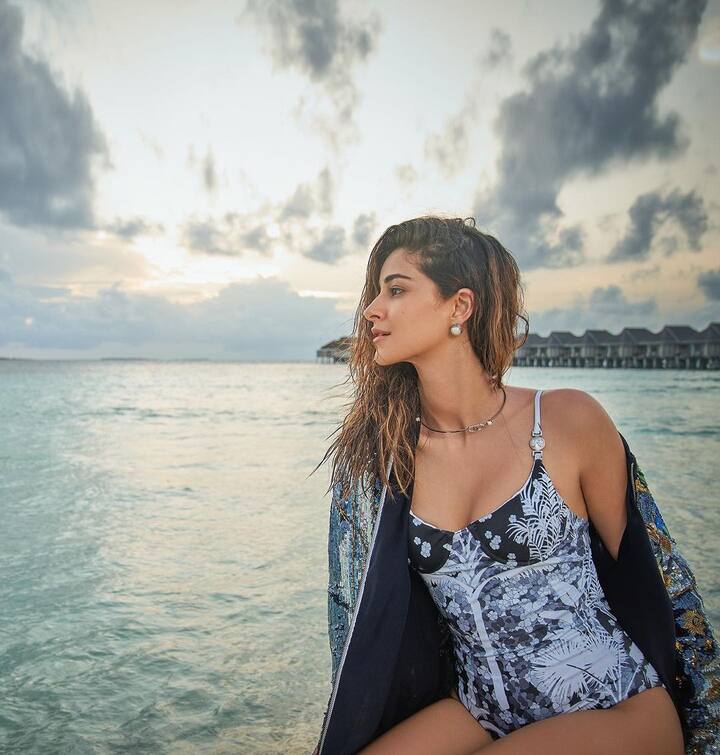 Ananya makes several hearts skip a beat as she flaunts her figure in a printed black and white monokini. She is raising oomph in the pictures.