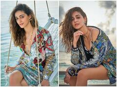 Ananya Panday Photo: डीपनेक शॉर्ट ड्रेस पहन अनन्या पांडे ने फिर धड़काया फैंस का दिल, बीच पर गोल्डन गर्ल की तरह आईं नजर