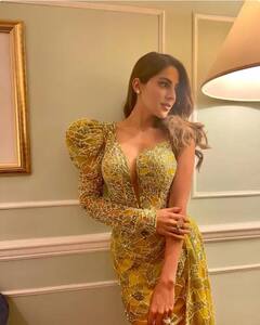 Nikki Tamboli Photos : डीप नेक टॉप अन् Stunning अवतार; निक्की तांबोळीचा ग्लॅमरस अंदाज