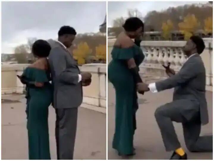 proposal video viral : man proposes to his girlfriend after secretly paris tour Trending Video: પ્રેમિકાને ગુપચુપ રીતે પ્રેમી લઇ ગયો પેરિસ ટૂર પર ને પછી.......... વીડિયો વાયરલ