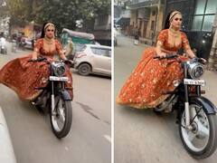 Watch : शादी के लिए सज-धज कर बुलेट पर निकली दुल्हन, स्वैग ऐसा कि देखने वाले देखते ही रह गए