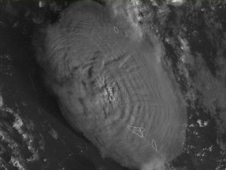 A screen grab taken from the NOAA GOES-West satellite on January 15, 2022 shows the volcanic eruption that provoked a tsunami in Tonga. The eruption was so intense it was heard as 
