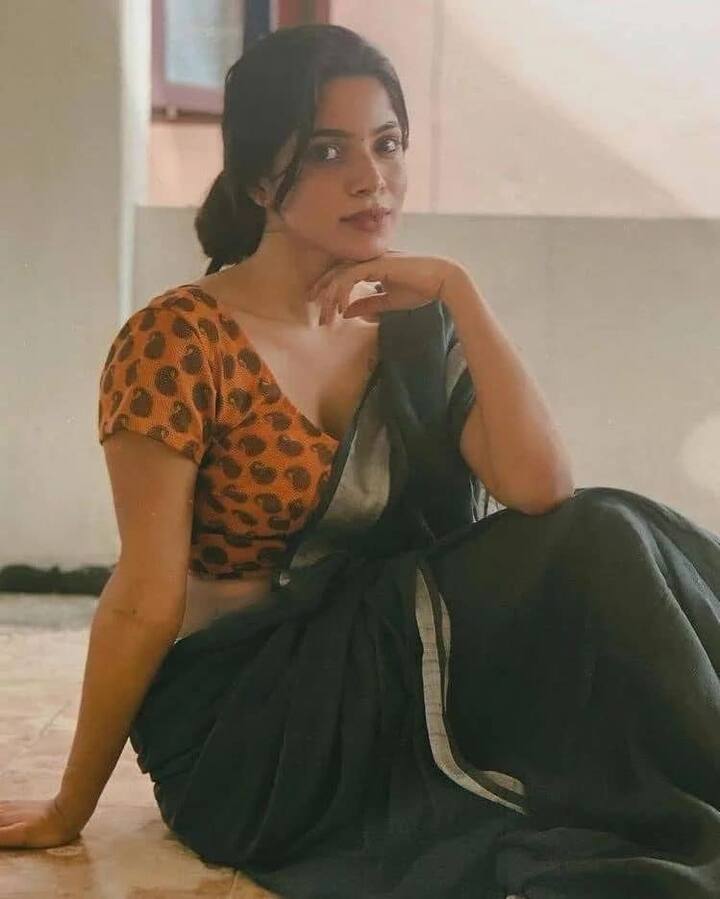 என்னை கொஞ்சும் மழையில் உன் வாசம்