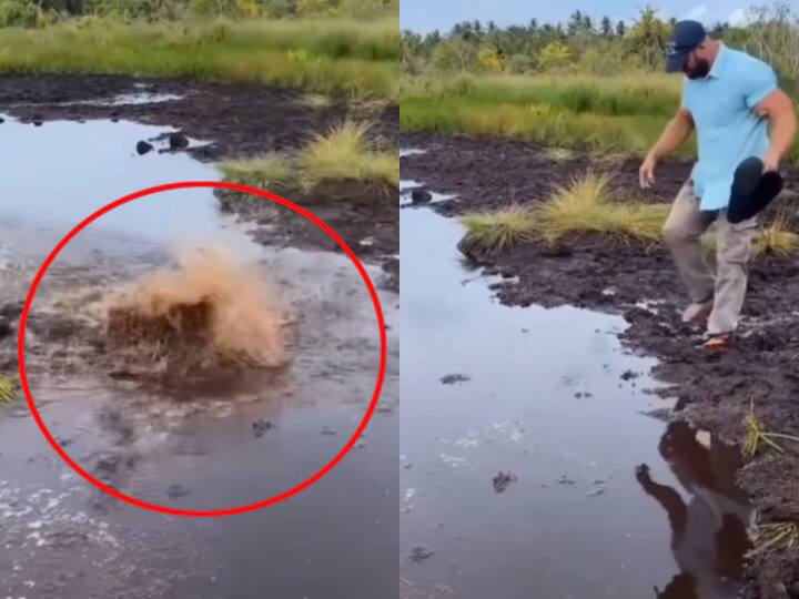 Man falling video in sewage as he removes his slippers in mud watch viral video Watch: कीचड़ में फिसलने के डर से शख्स ने उतारी चप्पल, पैर रखते ही हो गया गायब - वीडियो जमकर वायरल