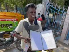 கரூரில் மக்கள் குறைத்தீர் கூட்டத்திற்கு செருப்பு மாலை அணிந்து வந்த நபரால் பரபரப்பு