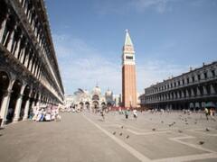 Woman Tourist Thrown Out Of Venice For Posing Topless On Memorial For Italy's War Heroes