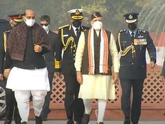 IN PICS | PM Modi Dons Brahma Kamal On His Cap Similar To Netaji Bose, Lays Wreath At National War Memorial