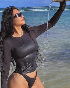 Kim Kardashian Deletes One Of Her Bikini Pic After Being Accused Of Photoshopping By Fans