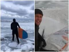 Watch: बर्फ से ढके समुंद्र में सर्फिंग करने निकला शख्स, वीडियो उड़ा देगा आपके होश