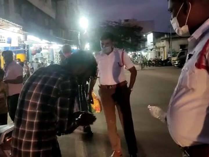 Traffic police advises drunken youth in Thanjavur தஞ்சையில் குடிபோதையில் வந்த இளைஞரை தண்ணீர் தெளித்து தெளிய வைத்து அனுப்பிய டிராபிக் போலீஸ்