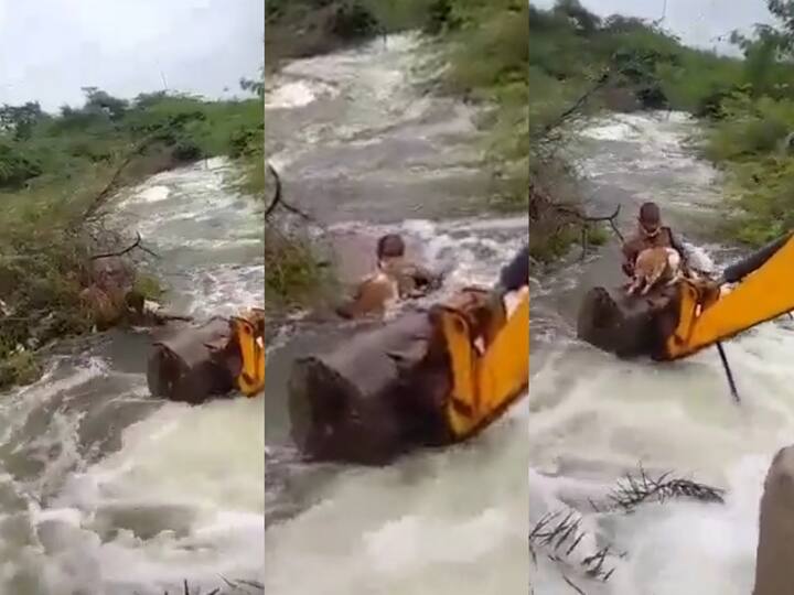 Telangana home guard risks his life to rescue dog stuck in overflowing stream. Watch video Watch Video: வெள்ளத்தில் சிக்கிய நாய்… துணிச்சலாக இறங்கிய ஊர்காவல்படை போலீஸ்… விடியோ வைரல்!